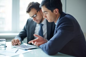 IT decision makers reviewing Microsoft Teams Phone pricing and real-world cost considerations